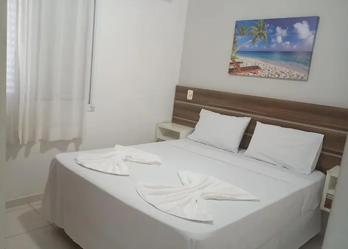 23A para 6 pessoas com Piscina e Churrasqueira no Cond Torremolinos Beach a 80m para Pé na areia na Praia da Enseada